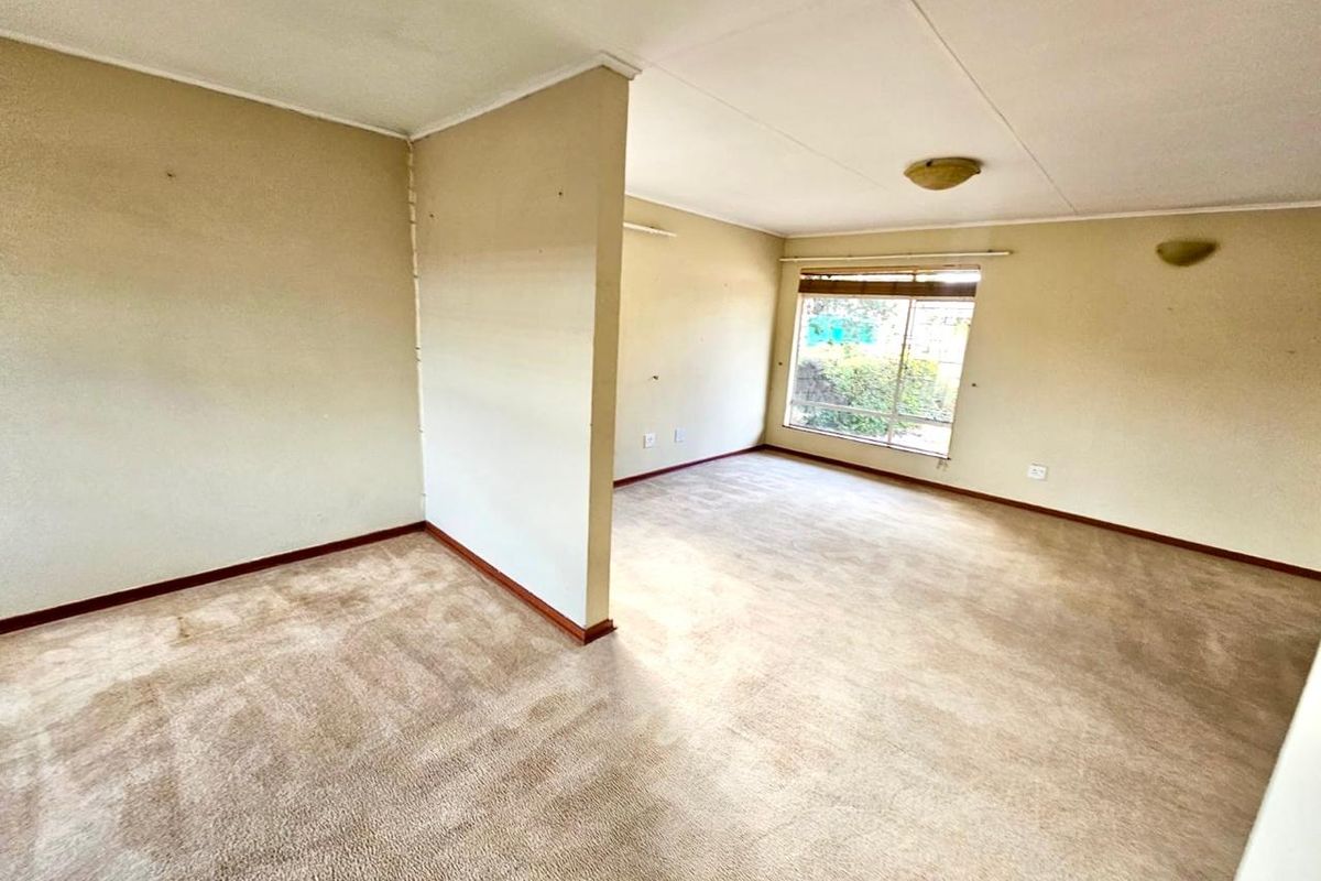 Strong, Spacious Family Home with Lapa, Braai and double garages for sale in Secunda - Photo 5