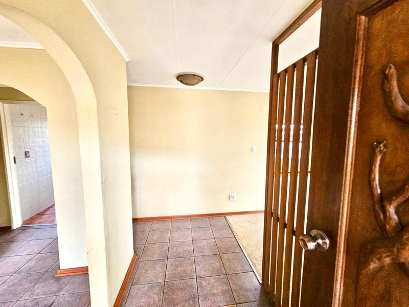 Strong, Spacious Family Home with Lapa, Braai and double garages for sale in Secunda - Photo 3