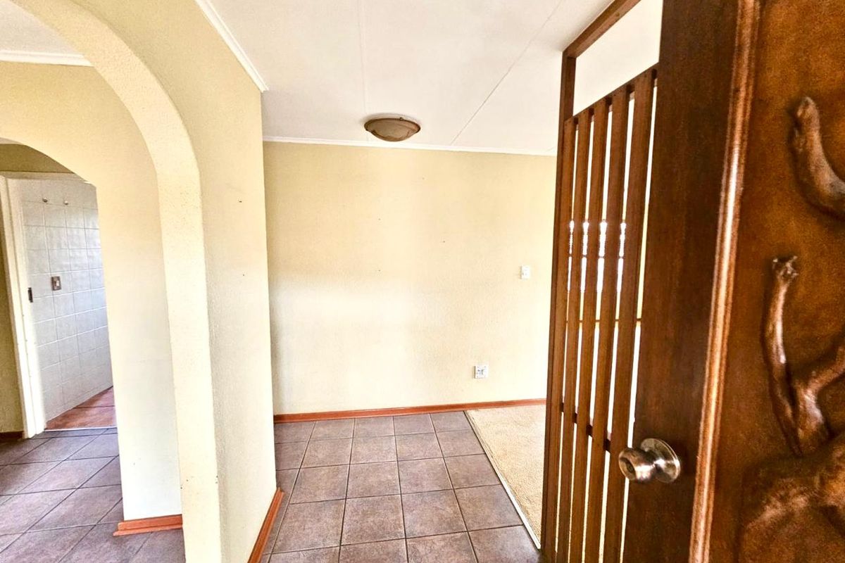 Strong, Spacious Family Home with Lapa, Braai and double garages for sale in Secunda - Photo 3