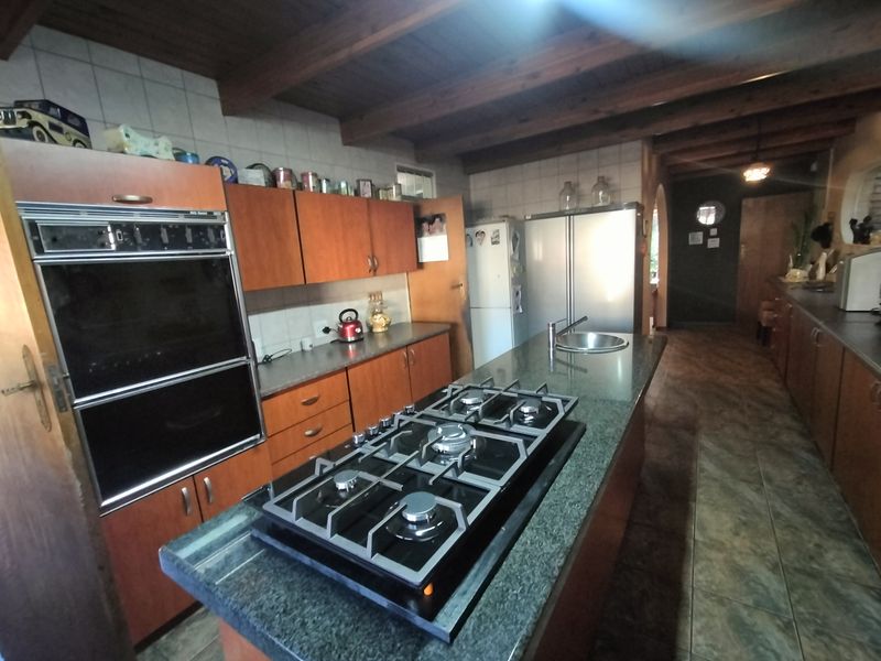 Spacious Family Home with Pool and Endless Potential in Florauna - Photo 9