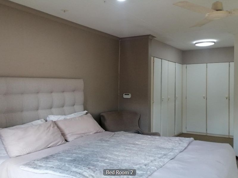 Spacious 3-Bedroom Family Home with Study, Staff Room & Pool in Prime Bryanston - Photo 10