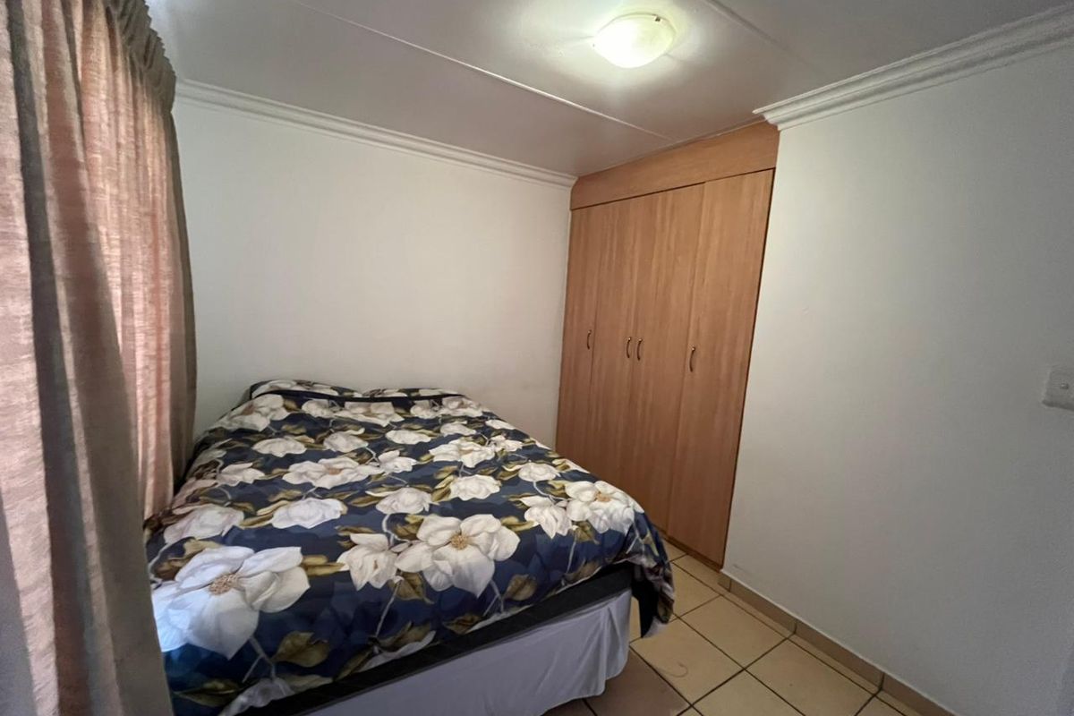 Cozy Comfort in a Secure Gated Community – Your Perfect Starter Home! - Photo 3