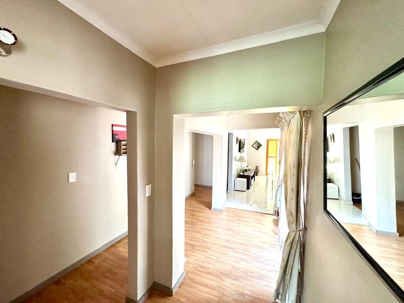 Spacious Family Home with Two Flats in Prime Trichardt Location - Photo 6