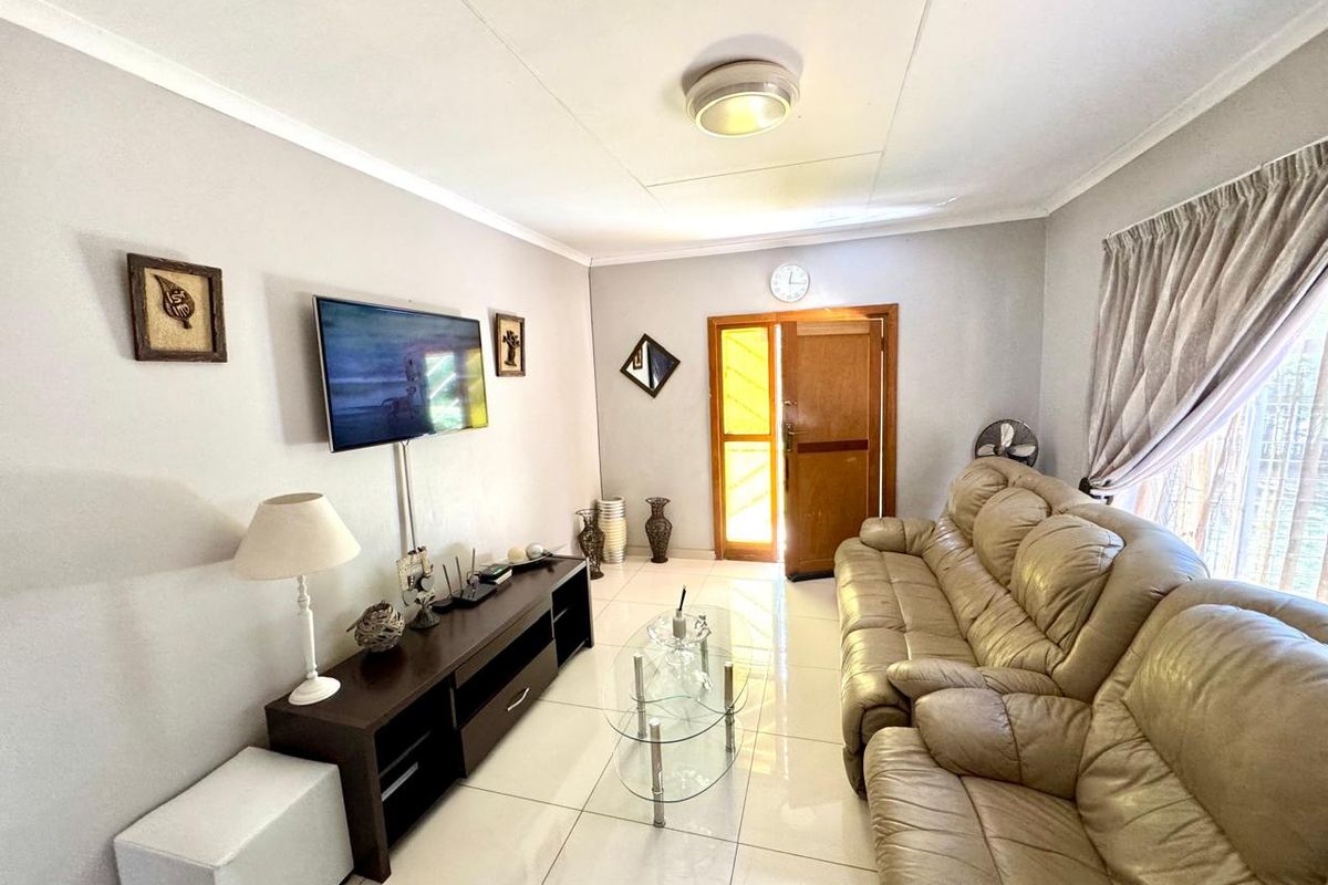 Spacious Family Home with Two Flats in Prime Trichardt Location - Photo 4