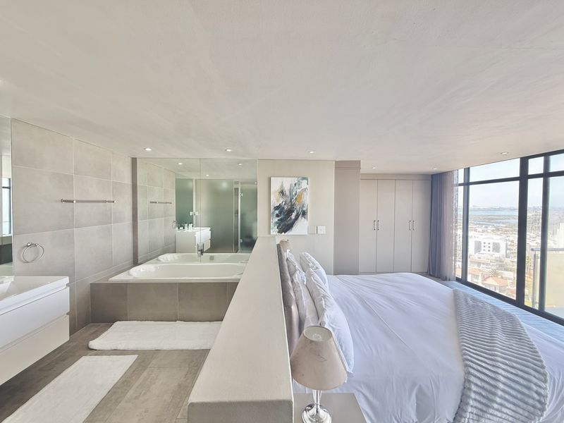 Luxury 4-Bedroom Penthouse for Sale in Aquarius Blouberg Beachfront - Photo 4