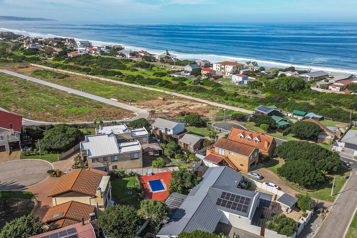 Duet, situated in a quiet cul-de-sac, boasts an ocean view. - Photo 3