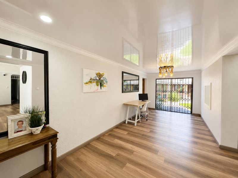Elegant Family Living with Luxury Finishes, Solar Power & Stunning Entertainment Areas - Photo 6