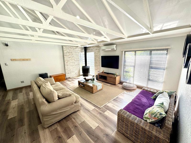 Elegant Family Living with Luxury Finishes, Solar Power & Stunning Entertainment Areas - Photo 8