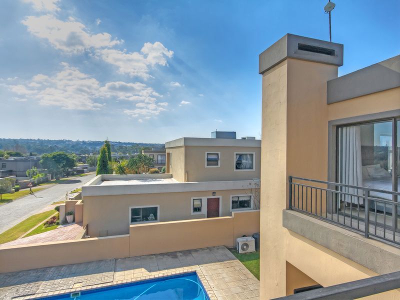 The Ultimate Entertainer’s Dream with Spectacular Views in a Secure Estate - Photo 1