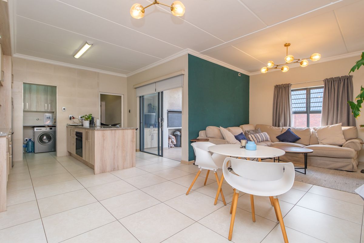 Modern North-Facing Apartment with Stylish Finishes & Built-in Braai - Photo 4