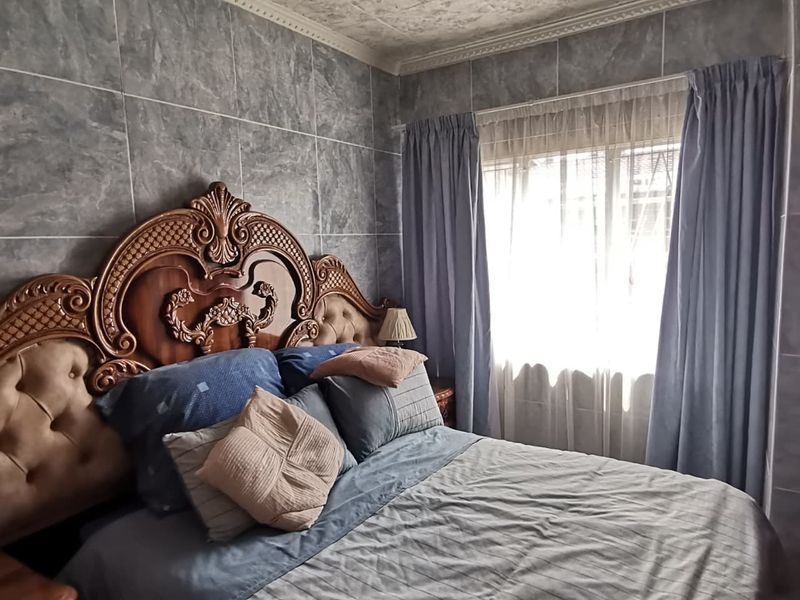 Easy Care 4-Bedroom Home in a Secure and Convenient Part of Letlhabile - Photo 7