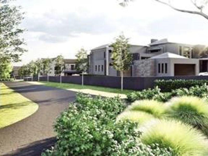 A high-quality architectural rendering of a modern residential estate featuring contemporary homes, paved pathways, and landscaped garden areas.