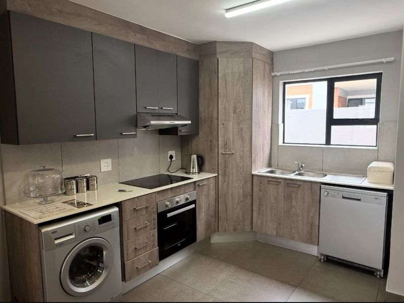 Secure Estate Living in Montana – Modern 2-Bed Apartment with Private Garden - Photo 2