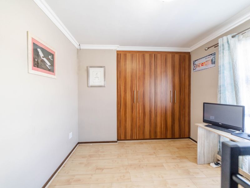 Step into elevated living with this beautifully positioned top-floor apartment in Olive Grove, Barbe - Photo 10