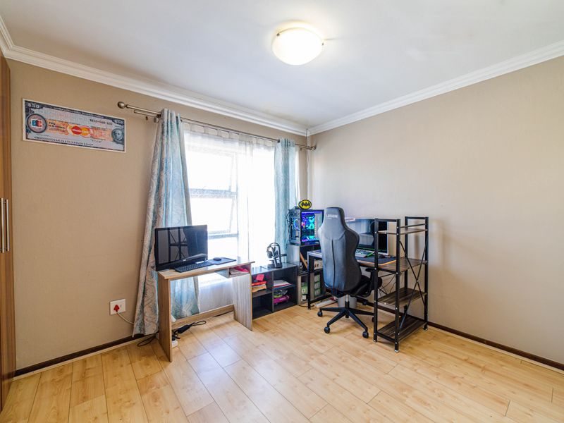 Step into elevated living with this beautifully positioned top-floor apartment in Olive Grove, Barbe - Photo 9