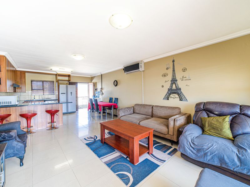 Step into elevated living with this beautifully positioned top-floor apartment in Olive Grove, Barbe - Photo 7