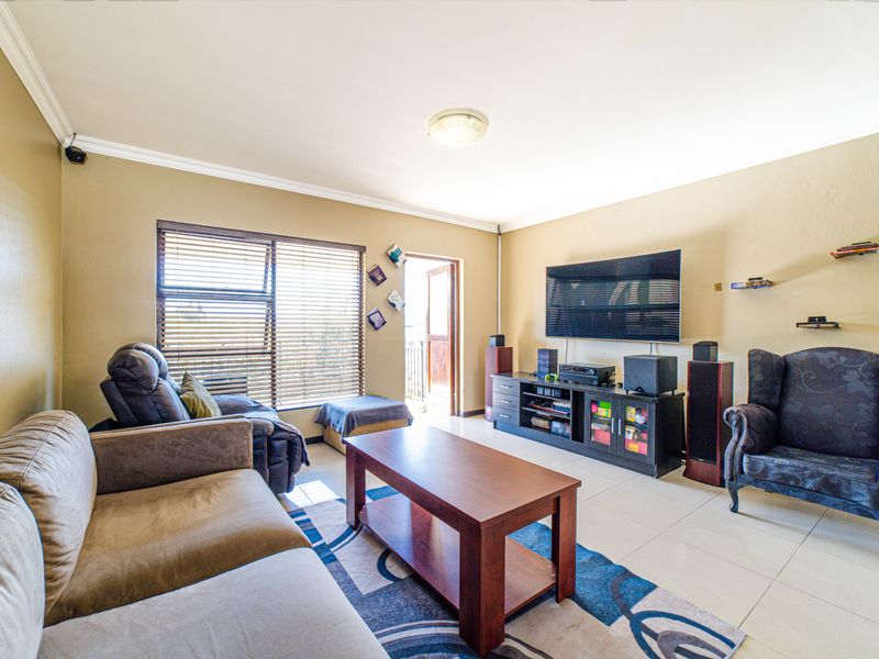 Step into elevated living with this beautifully positioned top-floor apartment in Olive Grove, Barbe - Photo 6