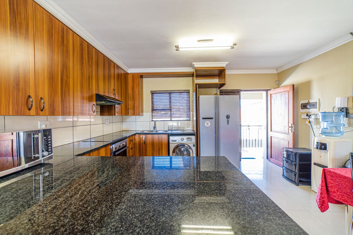 Step into elevated living with this beautifully positioned top-floor apartment in Olive Grove, Barbe - Photo 3