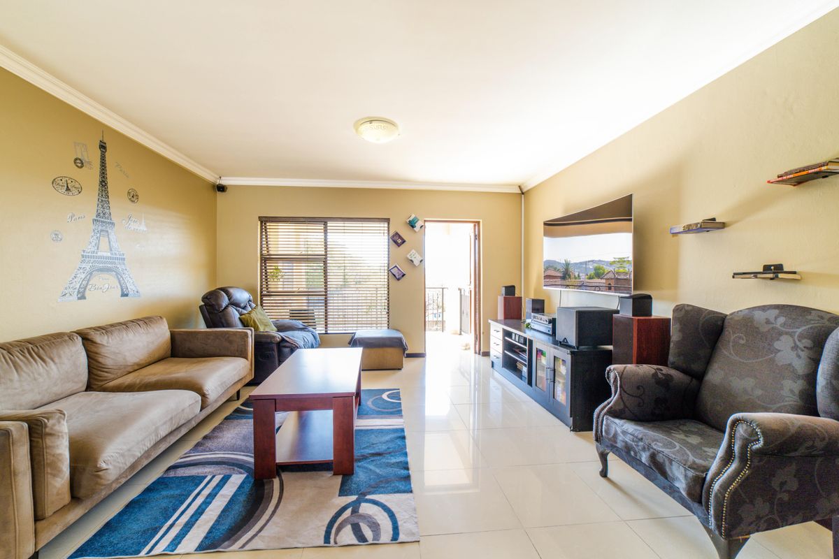 Step into elevated living with this beautifully positioned top-floor apartment in Olive Grove, Barbe - Photo 5