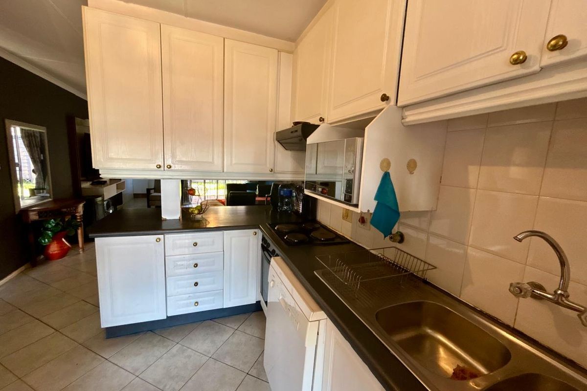 4 Bedroom Townhouse with Income-Generating Cottage | Walking Distance to Halfway House Primary - Photo 2