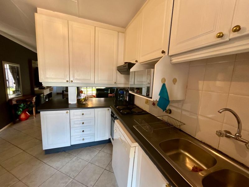 4 Bedroom Townhouse with Income-Generating Cottage | Walking Distance to Halfway House Primary - Photo 2