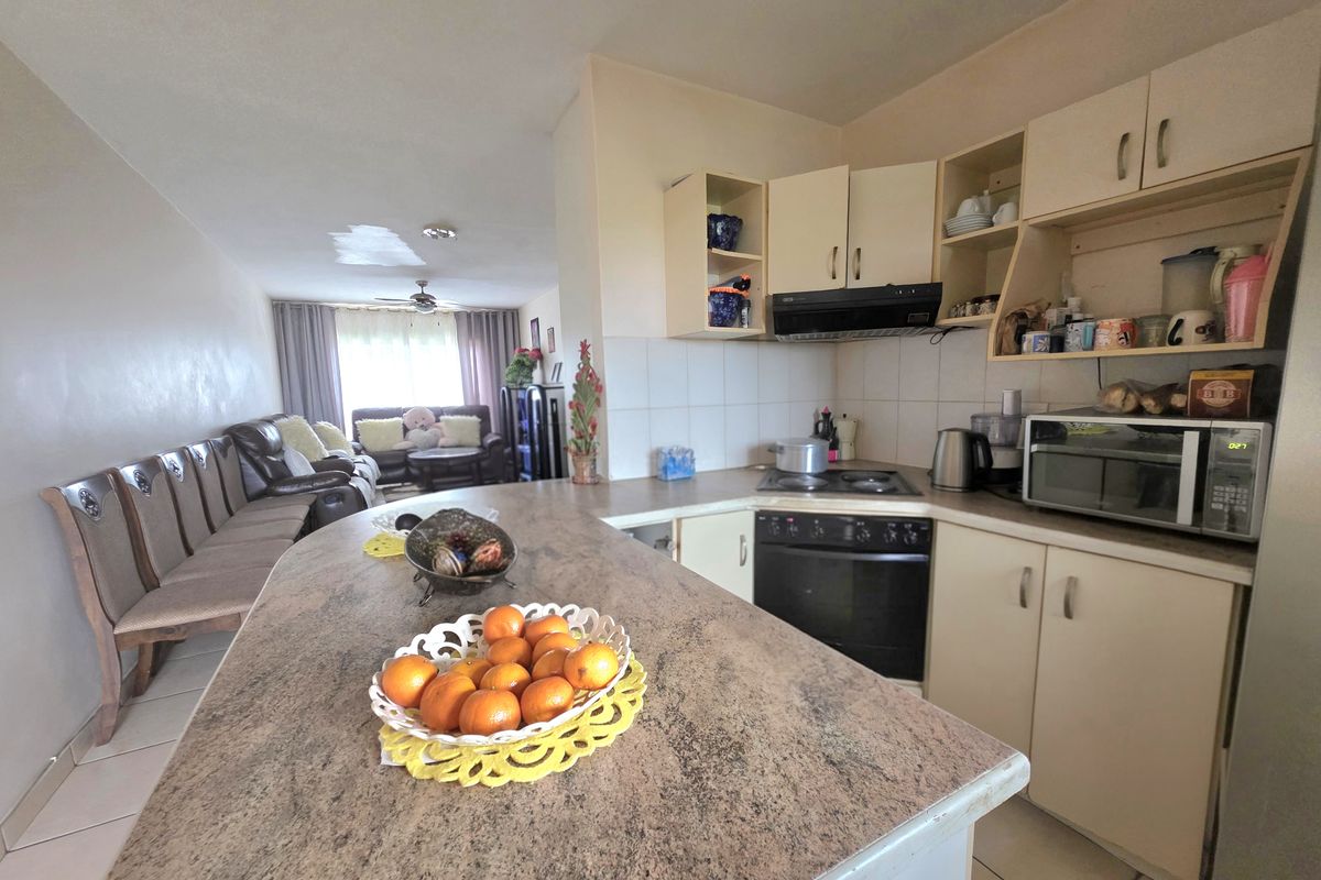 Convenient Living in a Secure Complex - Photo 3