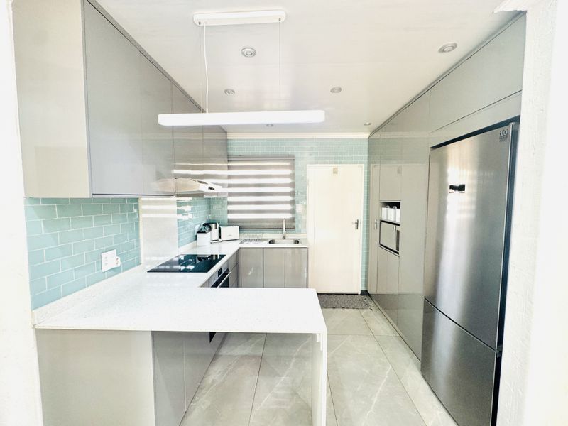 Modern Family Home with Solar Power, Pool & Stylish Finishes - Photo 6