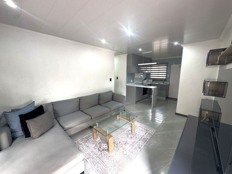 Modern Family Home with Solar Power, Pool & Stylish Finishes - Photo 7