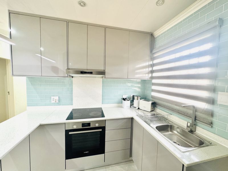 Modern Family Home with Solar Power, Pool & Stylish Finishes - Photo 2