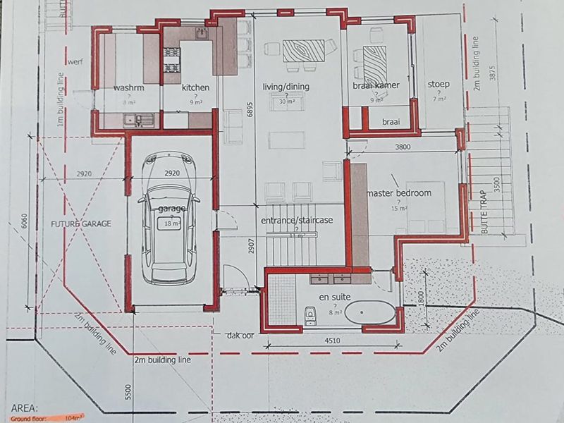 Architectural floor plan showing the layout of the ground floor, including living areas, kitchen, bedrooms, and garage.