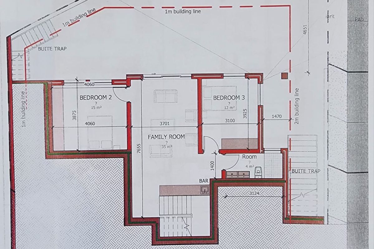 A detailed architectural floor plan showing the layout of the family room, bedrooms, bar area, and staircase.