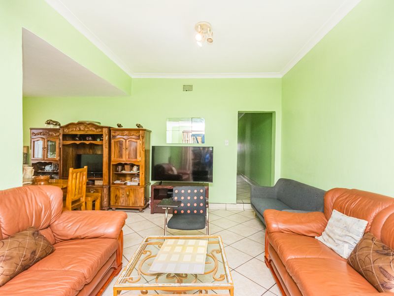 Investment Opportunity – 3-Bedroom Home With Income-Generating Outside Rooms - Photo 8