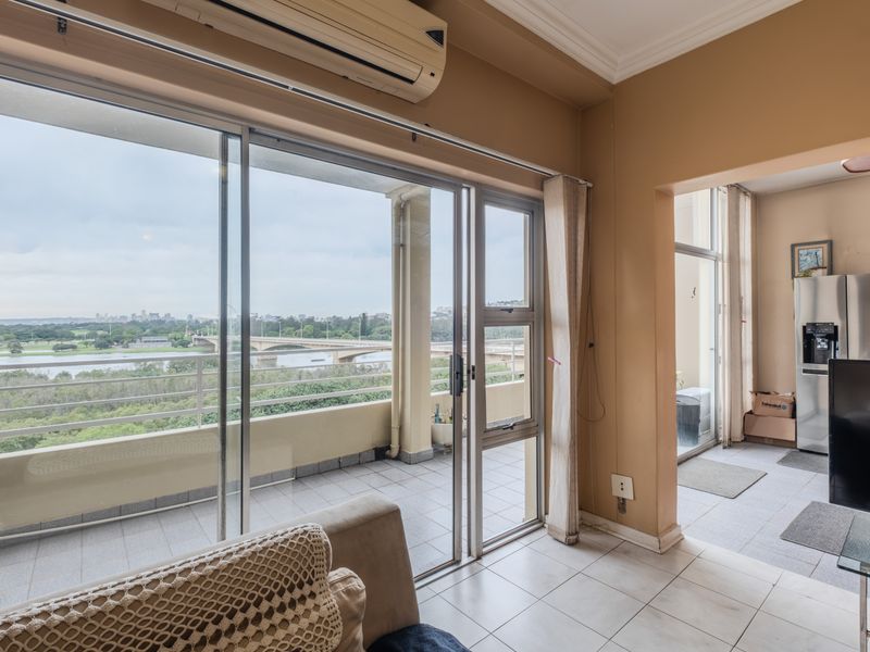 Priced to go duplex with exceptional river & sea views - Photo 7