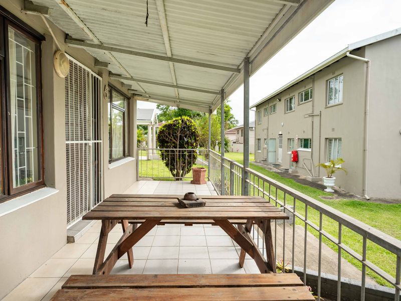 Peaceful Coastal Living with Private Garden Charm - Photo 2