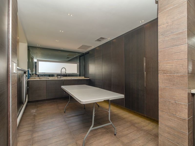 Modern Double-Storey Penthouse with Private Rooftop and Panoramic Sandton Views - Photo 10