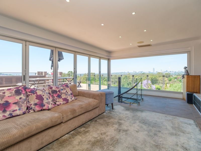 Modern Double-Storey Penthouse with Private Rooftop and Panoramic Sandton Views - Photo 8