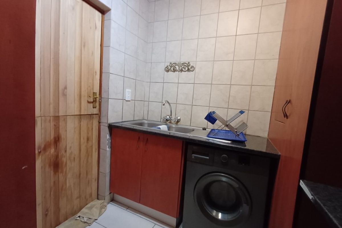 Modern Comfort and Convenience in a Secure Complex - Photo 5