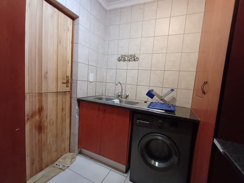 Modern Comfort and Convenience in a Secure Complex - Photo 5