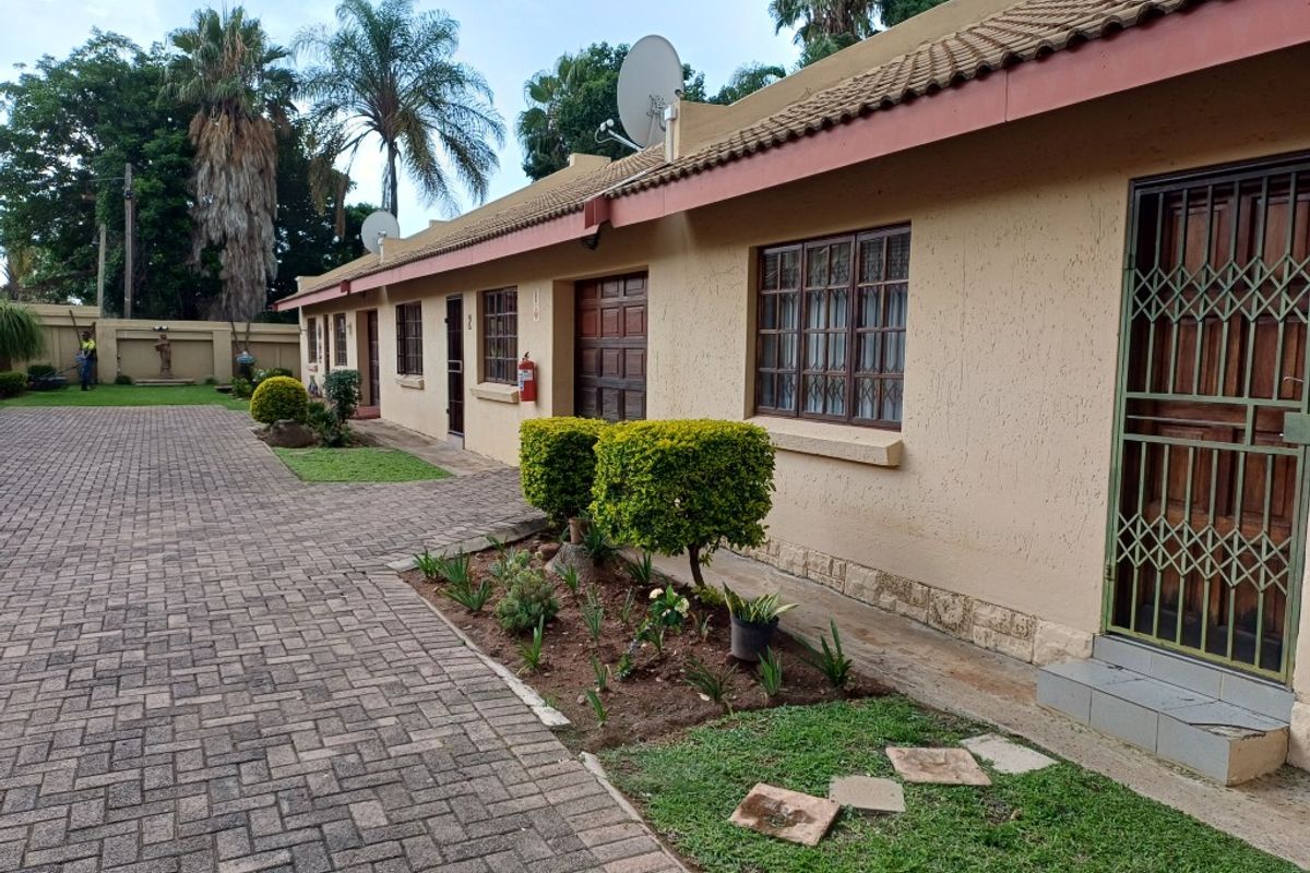 Modern Comfort and Convenience in a Secure Complex - Photo 2