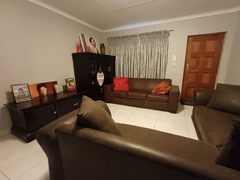 Modern Comfort and Convenience in a Secure Complex - Photo 6