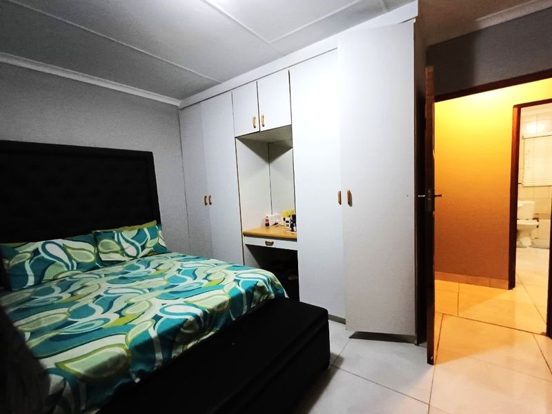 Modern Comfort and Convenience in a Secure Complex - Photo 8