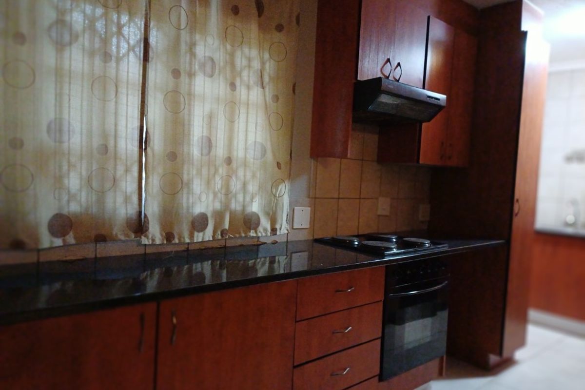 Modern Comfort and Convenience in a Secure Complex - Photo 4