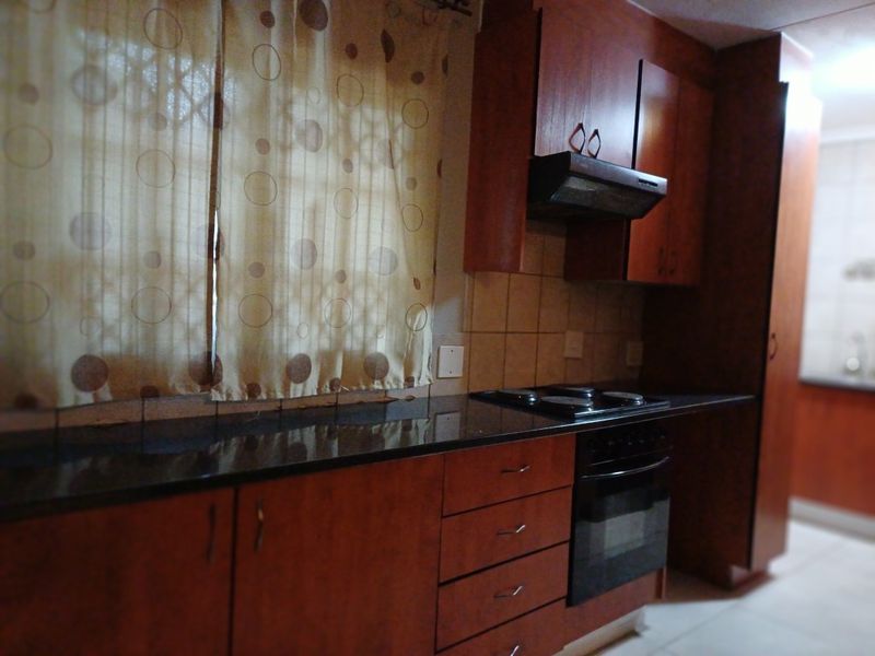 Modern Comfort and Convenience in a Secure Complex - Photo 4