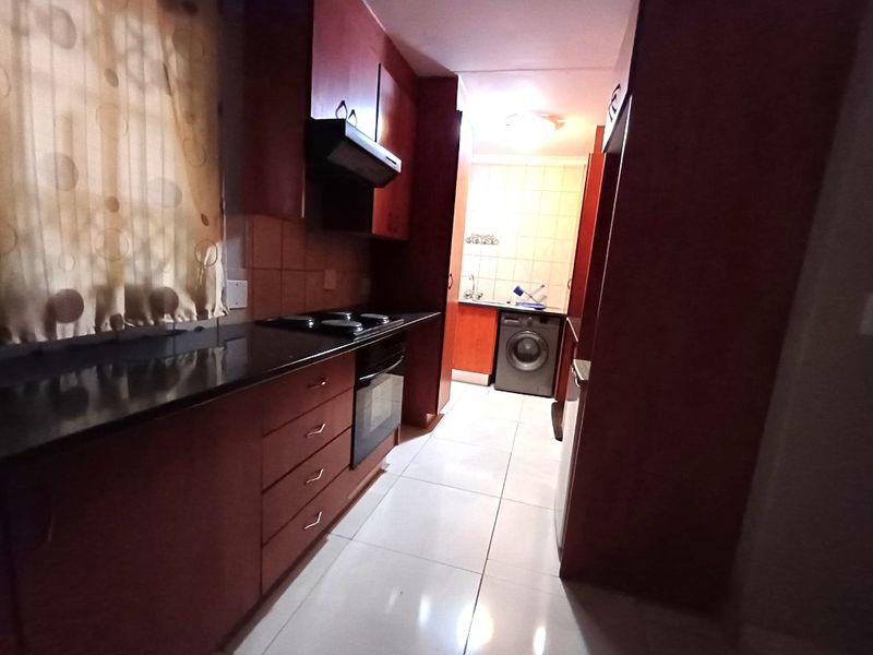 Modern Comfort and Convenience in a Secure Complex - Photo 3