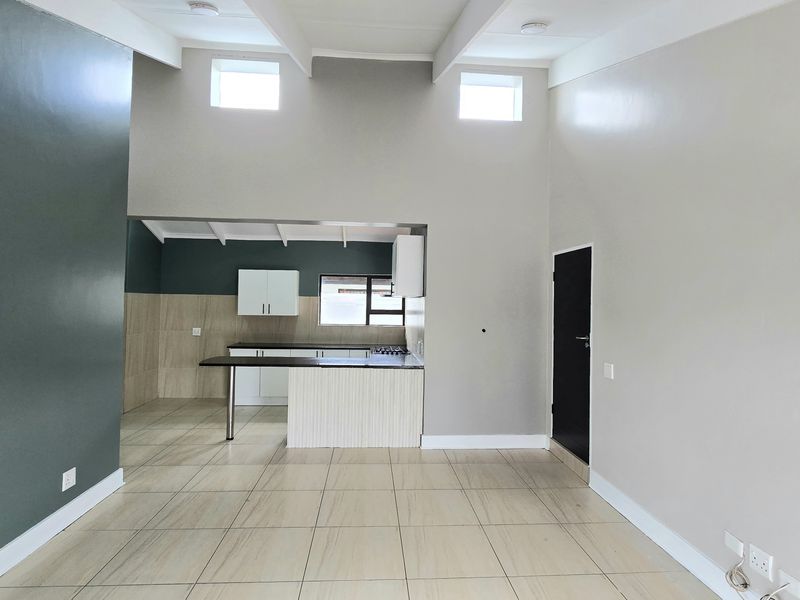 Spacious 3-Bedroom Home with Open-Plan Living and a Double Garage - Photo 10