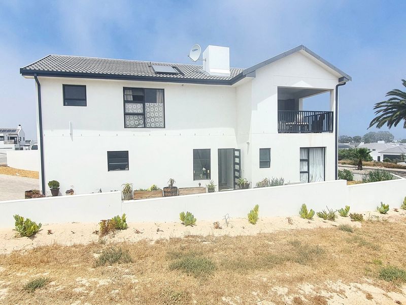 Double Story Home With Ocean Views & income potential - Shelley Point Coastal Security Golf Estate - Photo 2