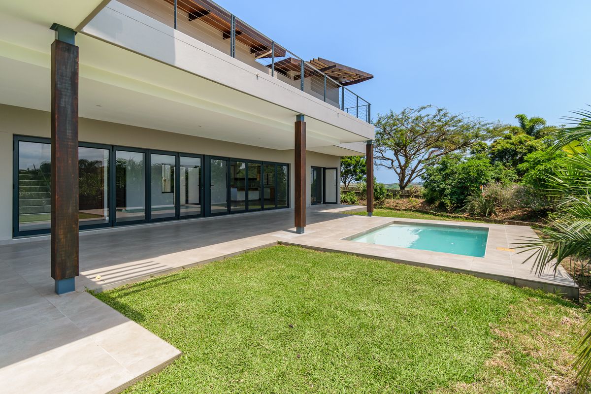 A Modern Masterpiece with Seamless Indoor-Outdoor Living - Photo 2