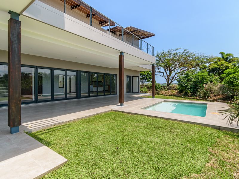 A Modern Masterpiece with Seamless Indoor-Outdoor Living - Photo 2