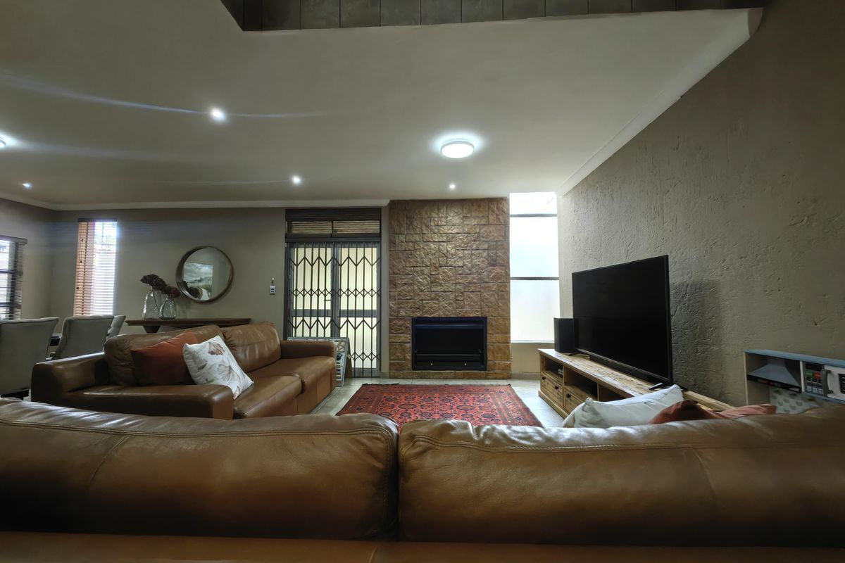 Spacious Modern Haven with Big Yard in Secure Gated Complex - Photo 4