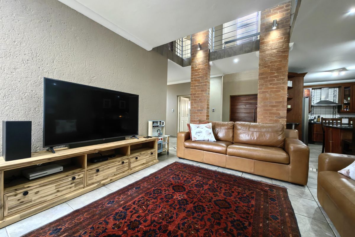 Spacious Modern Haven with Big Yard in Secure Gated Complex - Photo 5